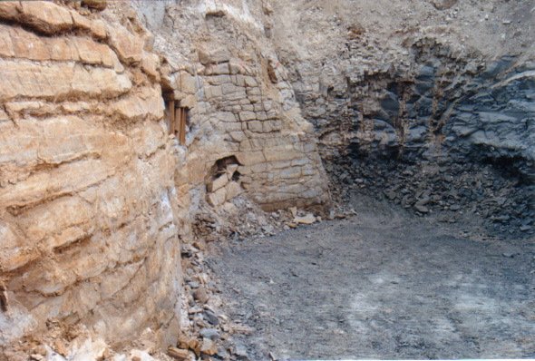 Window in wall following collapse.